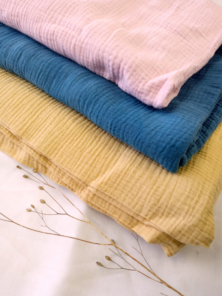 naturally dyed organic bubble fabric in yellow pink and blue
