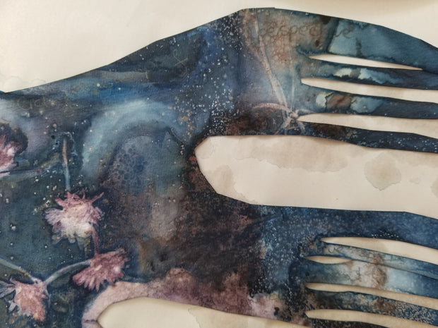 Decorated paper cut out with artistic design on a white background