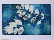 Artistic depiction of leaves on a blue textured background