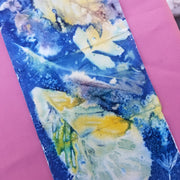 Abstract art with yellow and blue colors on a pink background