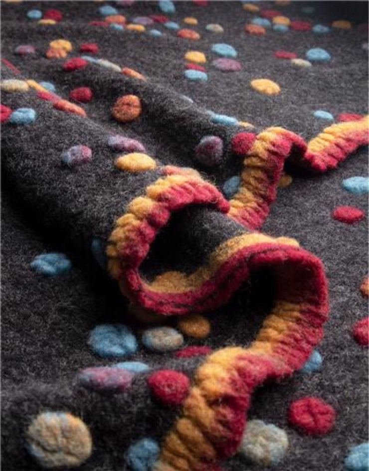 Colorful knitted blanket with a textured surface