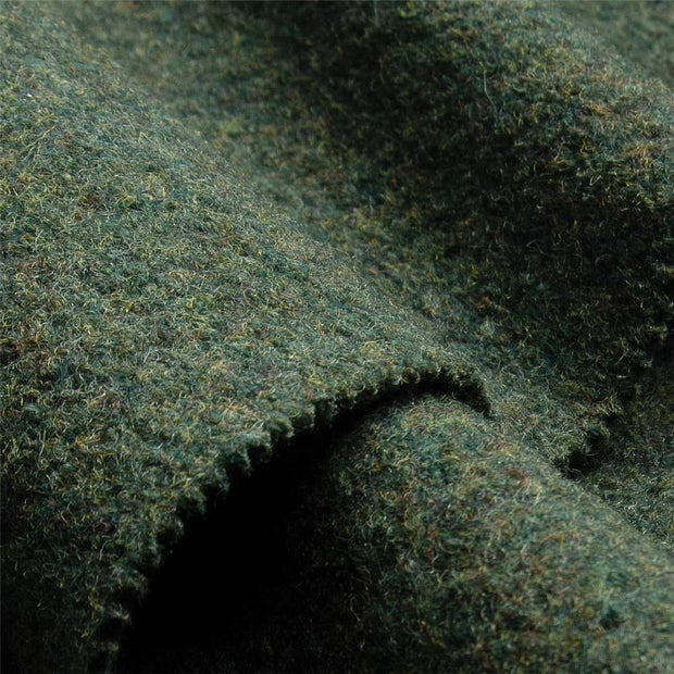 Green folded woolwalk fabric in detail