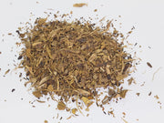 cut yellow brown dock root 
on a white background