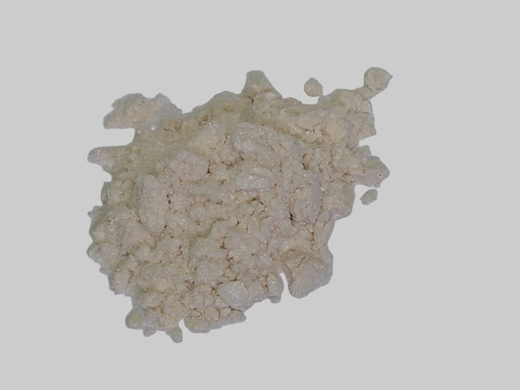 Clump of white powder on a white background
