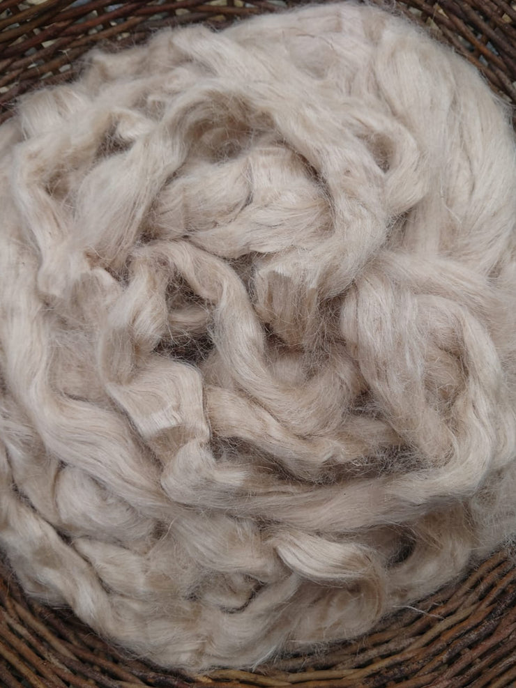 Loose Nettle fibre in a wooden woven basket