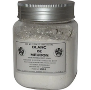 Jar of Blanc de Meudon powder with a silver lid on a white background