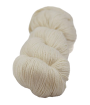 Snow white yeti yarn on a white background
