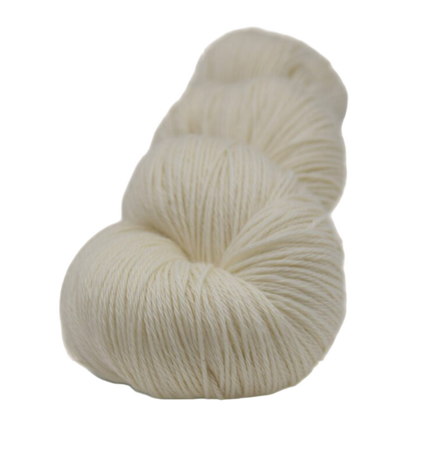 white cashmere merino yarn skein on a white background