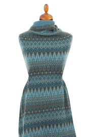 Knitted fabric with a pattern on a mannequin against a white background