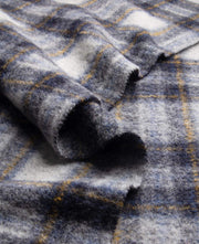 checkered plaid fabric in grey, blue white and yellow stripes
