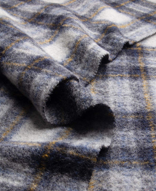 checkered plaid fabric in grey, blue white and yellow stripes