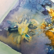 Abstract art with yellow and blue colors on a textured surface
