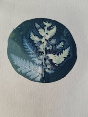 Circular design with leaf patterns on a textured surface