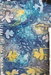 Abstract art piece with blue, yellow, and white colors