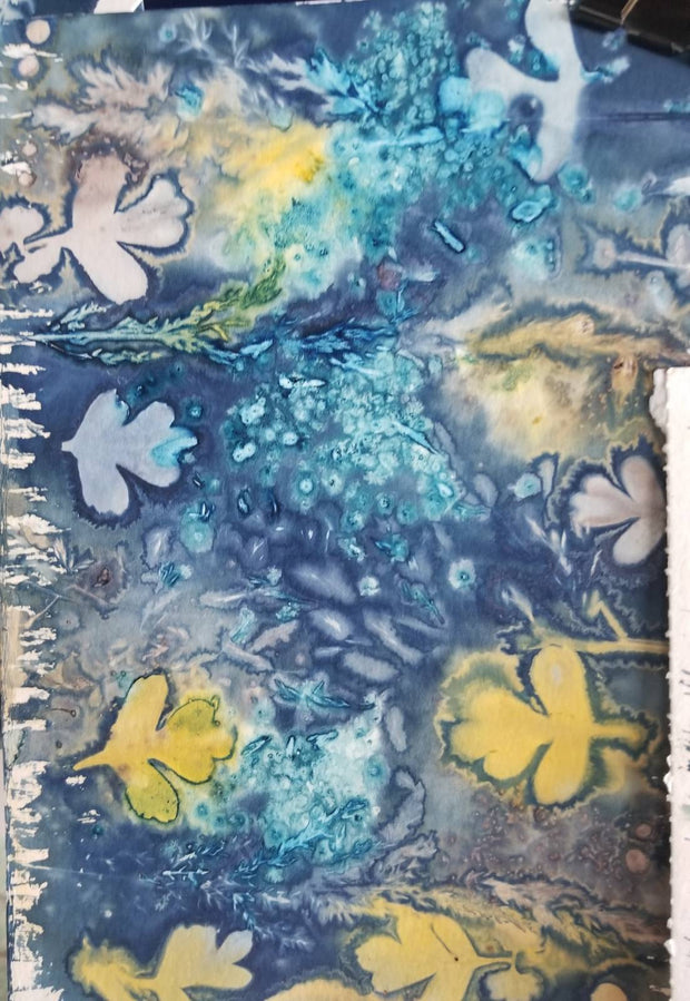 Abstract art piece with blue, yellow, and white colors