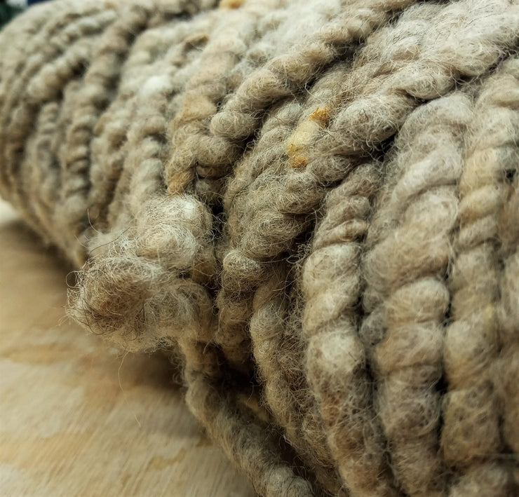 carpet yarn dark beige close up