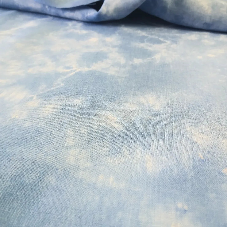 close up of indigo dyed shibori folded irish linen Clouds