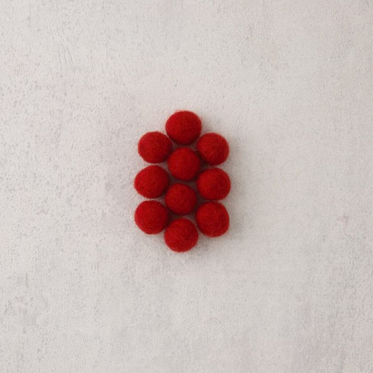 Red felt beads