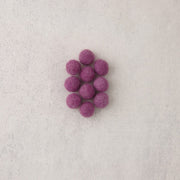 Dark pink felt beads