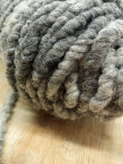 Dark grey carpet yarn close up